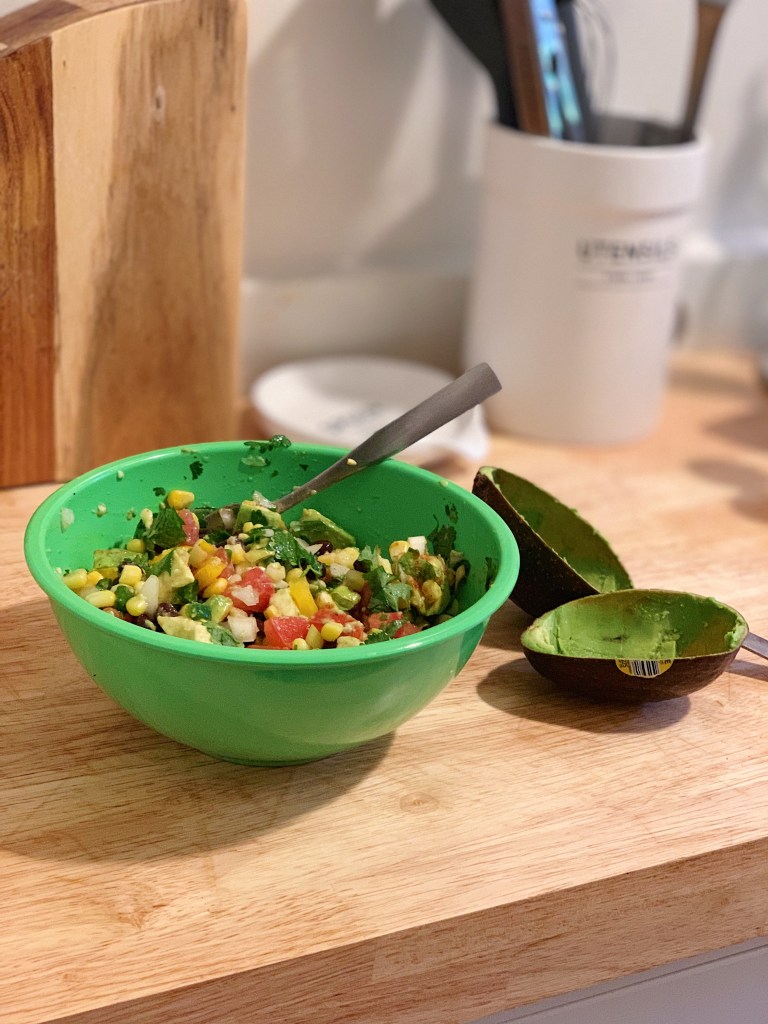 Pico de Gallo with corn, black beans, cilantro, tomato, avocado, and lime juice