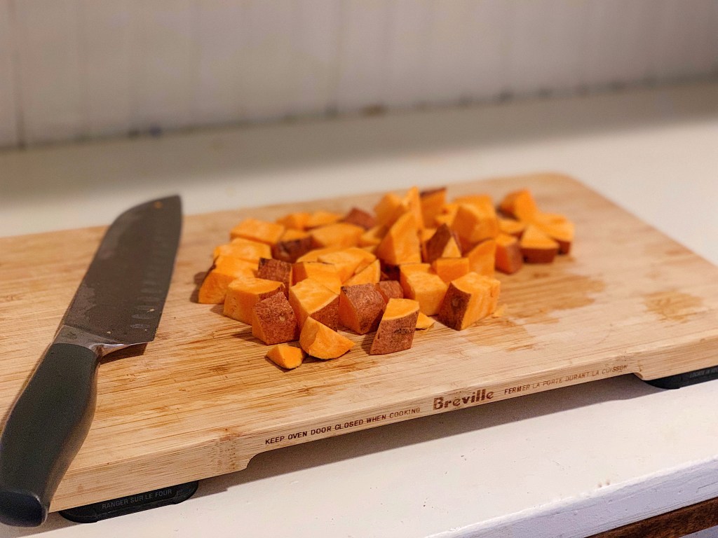 Diced sweet potato for Vegan Sweet Potato Burritos with Avocado Pico de Gallo